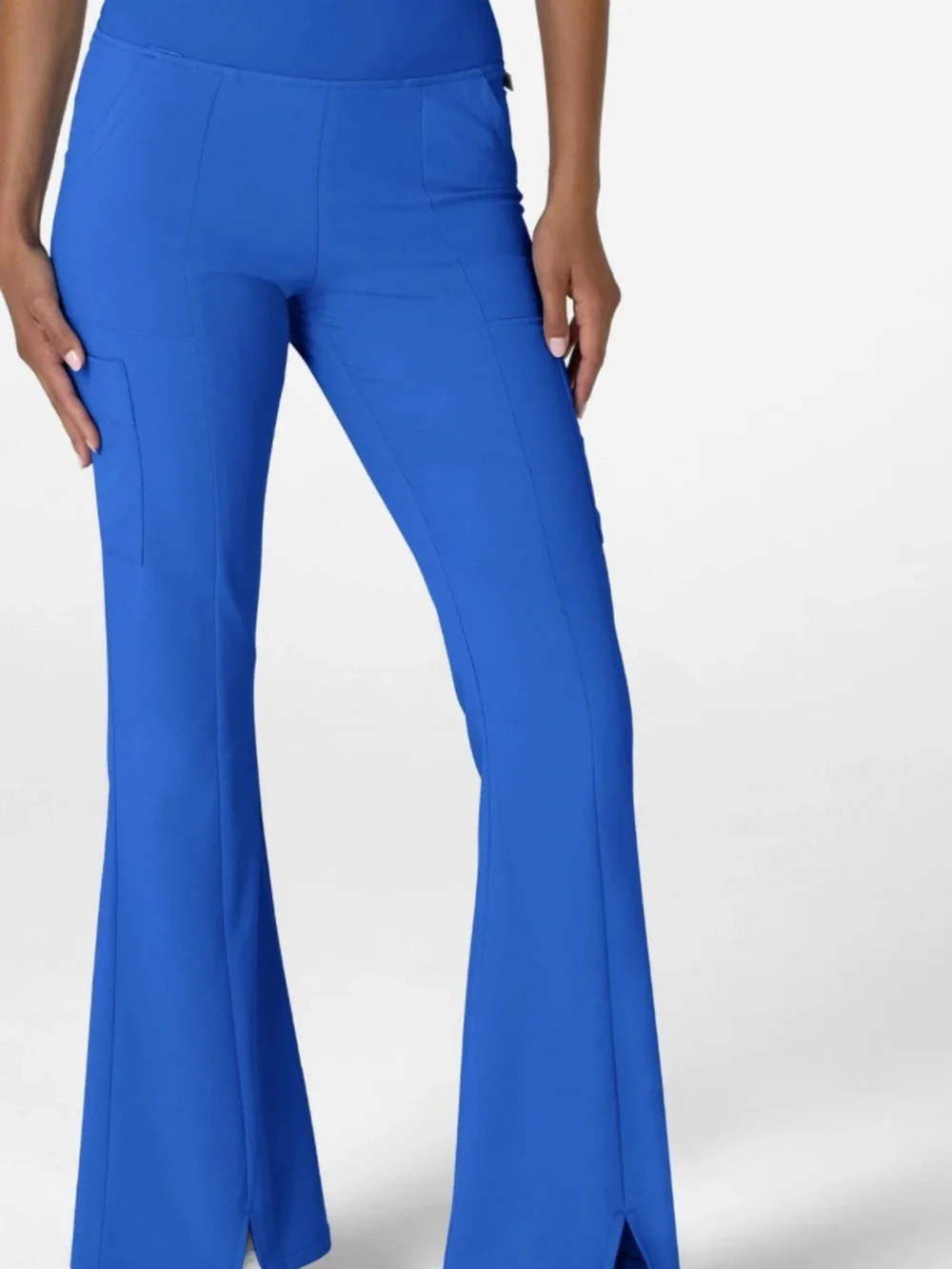 Free People Real Deal Slit Flare pants w/vibrant blue color distinct hem slits.